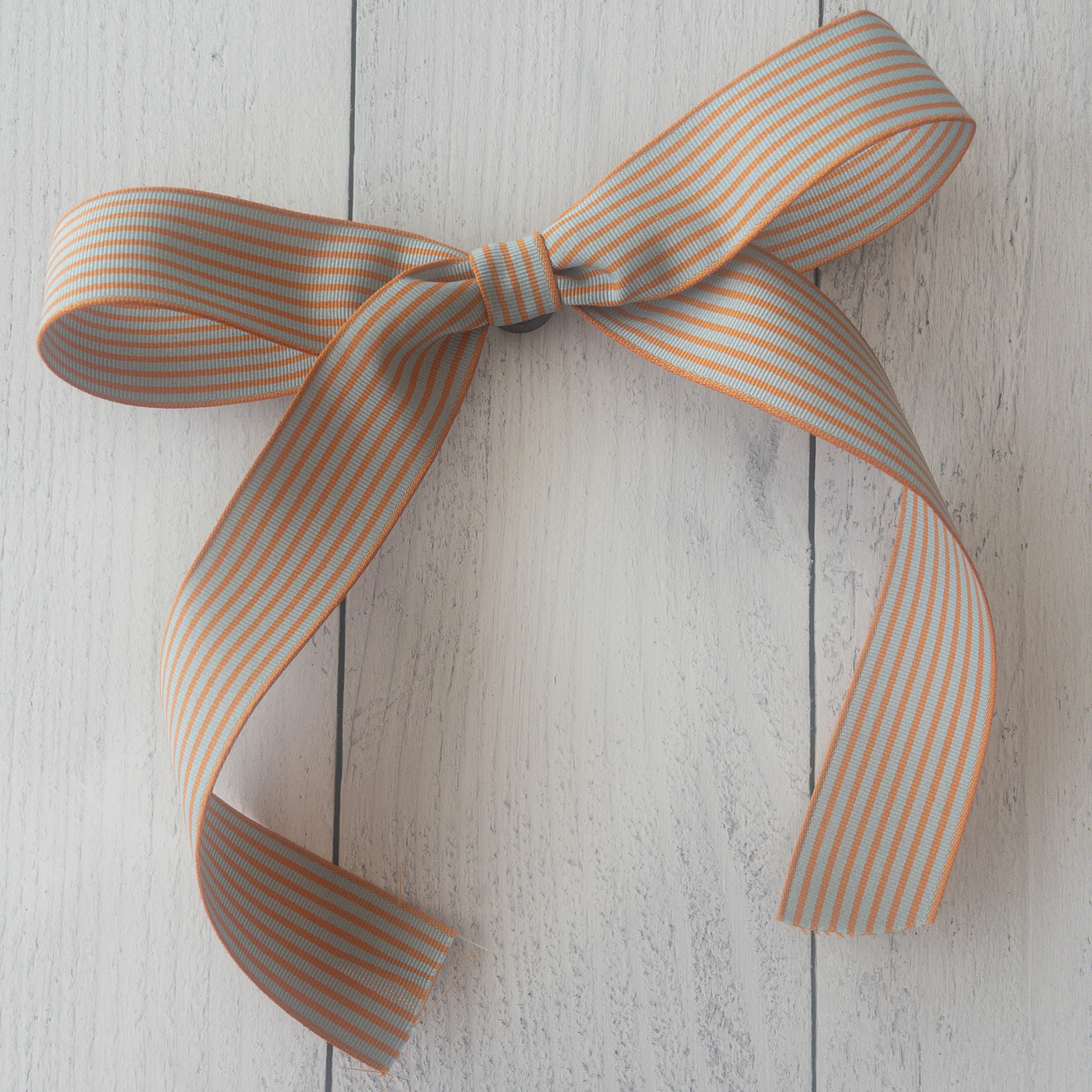 Orange and Light Blue Striped Bow